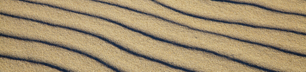 beach sand, Baltic Sea, detail, rippled by wind, photo by Charlie Alice Raya