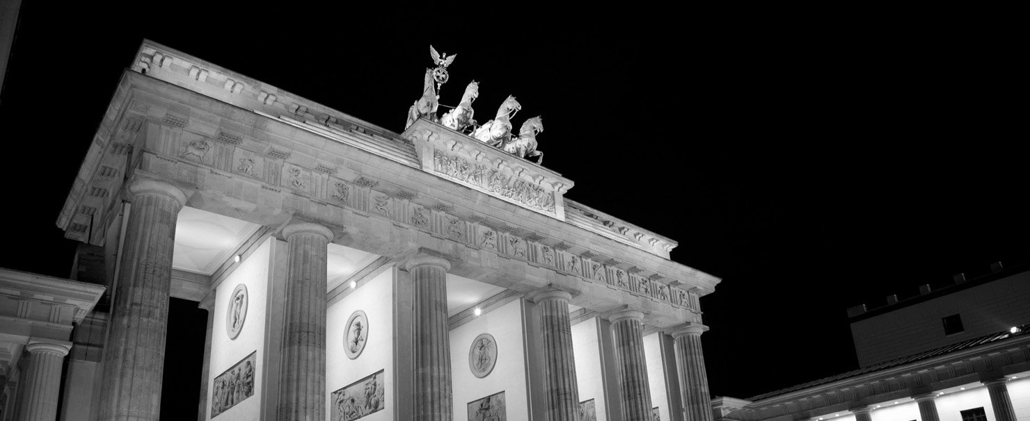 Brandenburg Gate at night, photo by Charlie Alice Raya